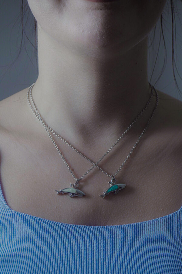 Aanyeh Charms' Shark Charm Necklace, filled with sand. A powerful symbol of strength and resilience. آنية.