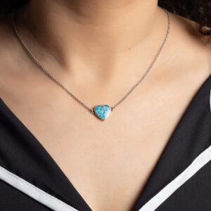 Aanyeh Charms' Love Heart Necklace filled with sand. A heartfelt piece that symbolizes deep affection. آنية.